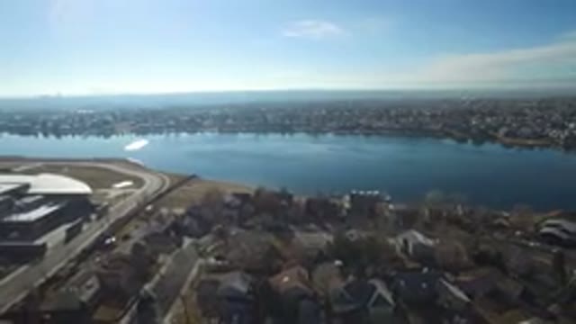 HIDDEN LAKE COLORADO-2016: Drone Footage Over Town And Lake Buildings Roads Sun