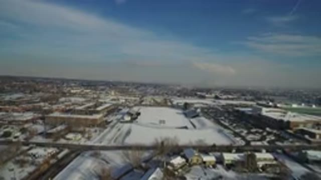 HIDDEN LAKE COLORADO-2016: Swiveling Camera Over A Beautiful City On A Snowy Day