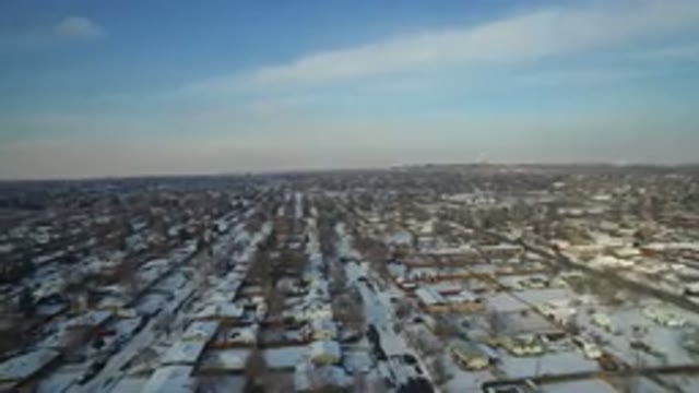 HIDDEN LAKE COLORADO-2016: Drone Films Suburban Skyline Of A Flat Suburban Town