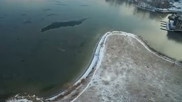 HIDDEN LAKE COLORADO-2016: Edge Of A Large Lake Or Sea Showing Road Up To Large House