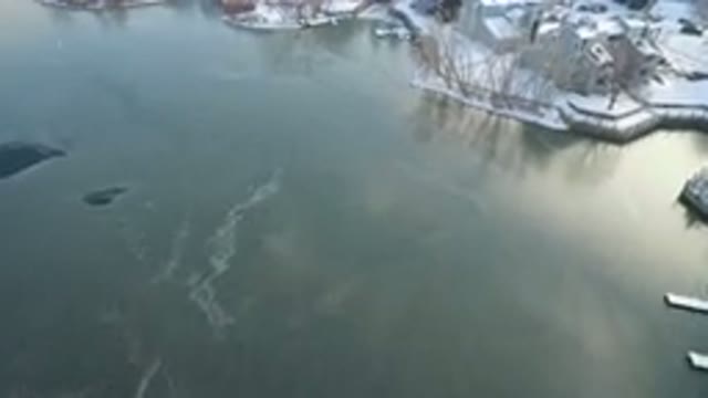 HIDDEN LAKE COLORADO-2016: Drone Footage Over Frozen Lake Snow Covered Ground