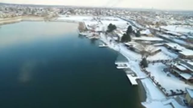HIDDEN LAKE COLORADO-2016: Drone Footage Over Lake Near Town Buildings Piers