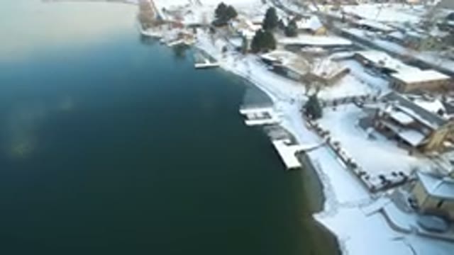 HIDDEN LAKE COLORADO-2016: Aerial View Of Snow Covered Lake Shore Area In The