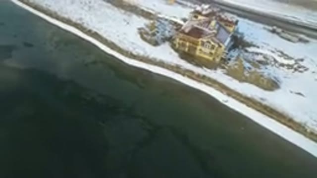 HIDDEN LAKE COLORADO-2016: Aerial Footage Of A Snowy Patch Of Land Between Water