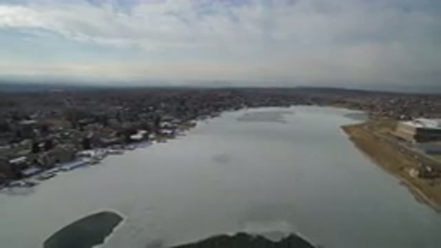HIDDEN LAKE COLORADO-2016: Drone Footage Over Partially Frozen Lake Town