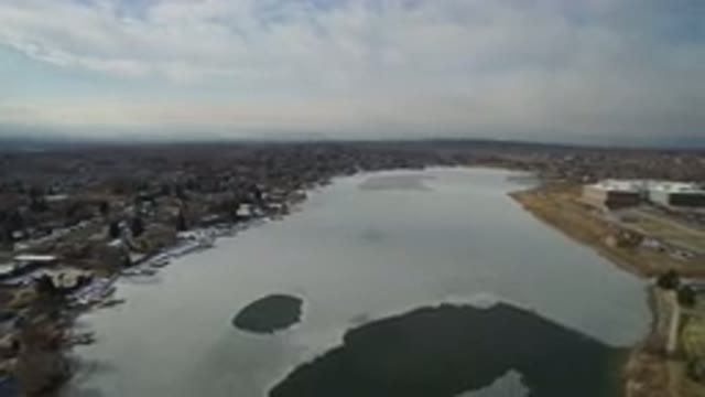 HIDDEN LAKE COLORADO-2016: Rotating Overhead Drone Footage Of Lake Buildings And Woods