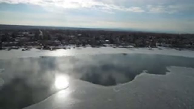 HIDDEN LAKE COLORADO-2016: Drone Footage Over Partially Frozen Lake Town On Lake
