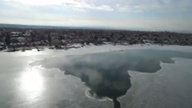 HIDDEN LAKE COLORADO-2016: A Frozen Lake Near Residential Area During Winter