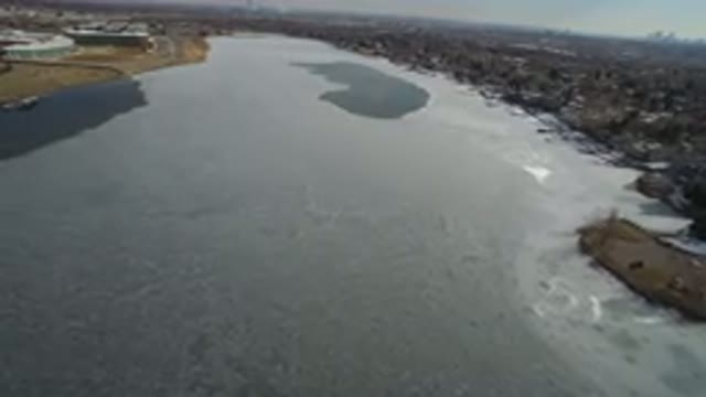 HIDDEN LAKE COLORADO-2016: Flying Over A Calm Thawing Lake In The Early Spring