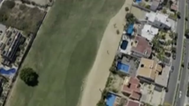 LOS CABOS MEXICO-2019: Flyover Video Of An Area Of A City Showing Thousands Of Homes And Apartment Complexes