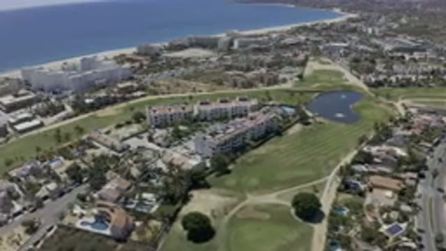 LOS CABOS MEXICO-2019: Drone Footage Over Suburban Neighborhood Condos And Golf Courses