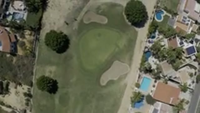 LOS CABOS MEXICO-2019: Aerial View of Golf Course Behind Residential Homes