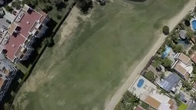 LOS CABOS MEXICO-2019: Downward Facing Drone Footage Over Golf Course And Large Homes