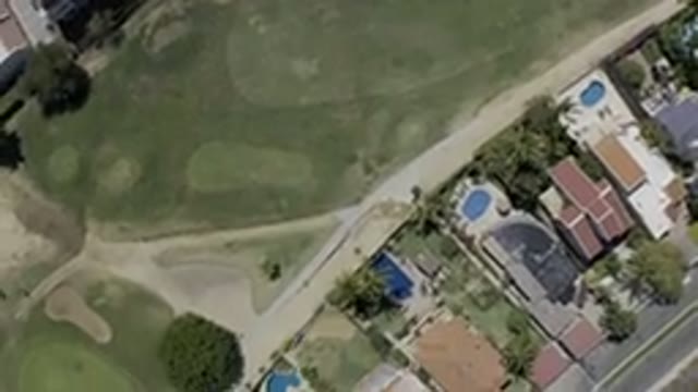 LOS CABOS MEXICO-2019: Residential Green Golf Course Bordering Homes With Pools