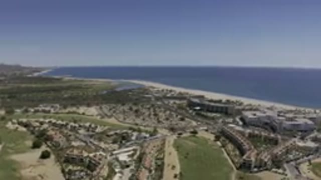 LOS CABOS MEXICO-2019: Coastline Sky Sand Buildings Blue Pacific