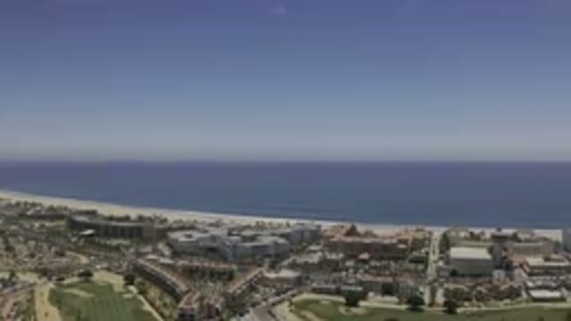 LOS CABOS MEXICO-2019: Camera Slowly Rising Over City Coastline and Sea