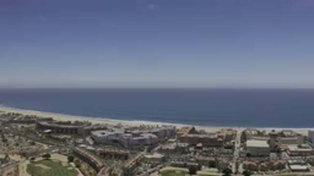 LOS CABOS MEXICO-2019: A View Of A Blue Sky Over A Nice Area Full Of Homes And