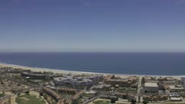 LOS CABOS MEXICO-2019: Blue Sky With Blue Water And An Area Full Of Buildings