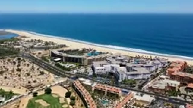 LOS CABOS MEXICO-2019: Airplane Landing at Vacation Resort with Beautiful Beach