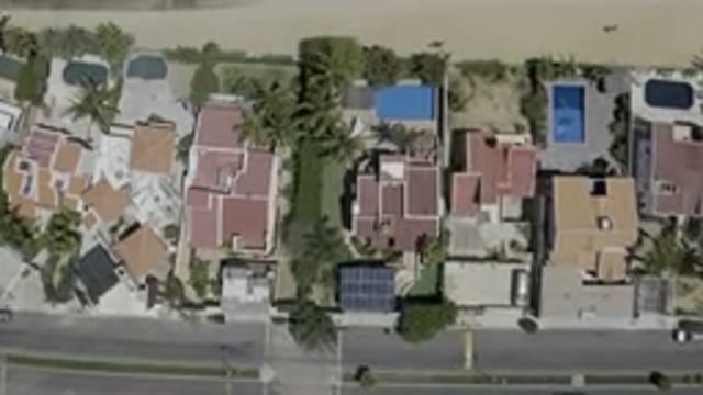 LOS CABOS MEXICO-2019: Bird's Eye View Of Red-Roofed Houses With Pools Next To