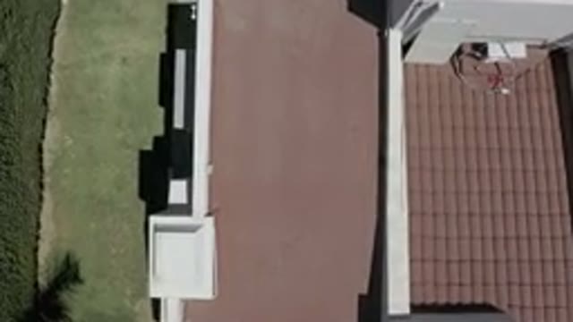 LOS CABOS MEXICO-2019: Drone Getting Closer To Landing On Flat Tiled Roof