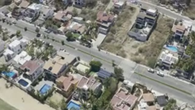 LOS CABOS MEXICO-2019: A City With Many Houses And Grass And Cars