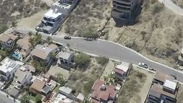 LOS CABOS MEXICO-2019: Buildings Houses Lands Trees Cars Roads Streets Villas