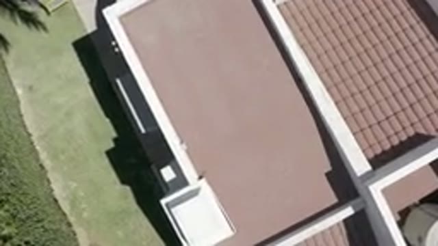 LOS CABOS MEXICO-2019: Aerial Footage Of A Roof To A Building And The Grassy Area