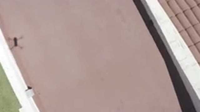 LOS CABOS MEXICO-2019: Drone Trying To Land On The House Surface With A Red Roof
