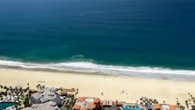LOS CABOS MEXICO-2019: Video Sped Up Of A Beach Side With Water Flowing Back & Forth