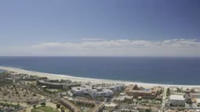 LOS CABOS MEXICO-2019: Camera Slowly Pans Over City Coastline and Sea