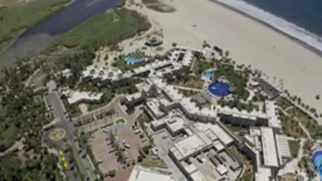 LOS CABOS MEXICO-2019: Holiday Summer Hotels Pool Swimming Beach Sea Sky Trees