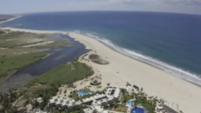 LOS CABOS MEXICO-2019: Air Footage Of A Beach Resort On A Very Long Beach And