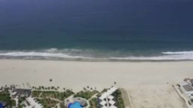 LOS CABOS MEXICO-2019: View Of The Ocean And Deserted Beach Under Blue Sky