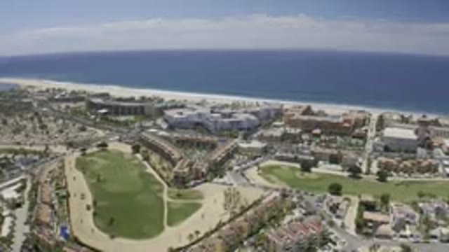 LOS CABOS MEXICO-2019: Aerial View Of A Beach Side City With An Ocean Background