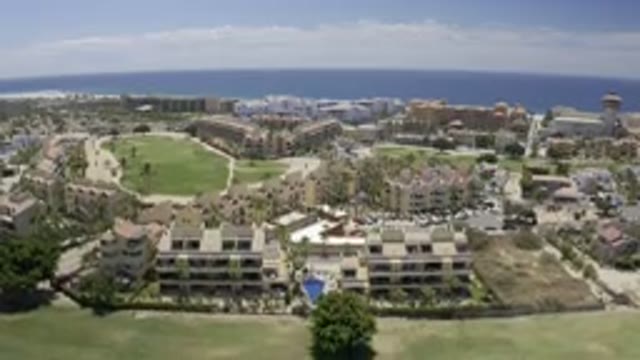 LOS CABOS MEXICO-2019: Top View City Capacity Slow Camera Descending Buildings