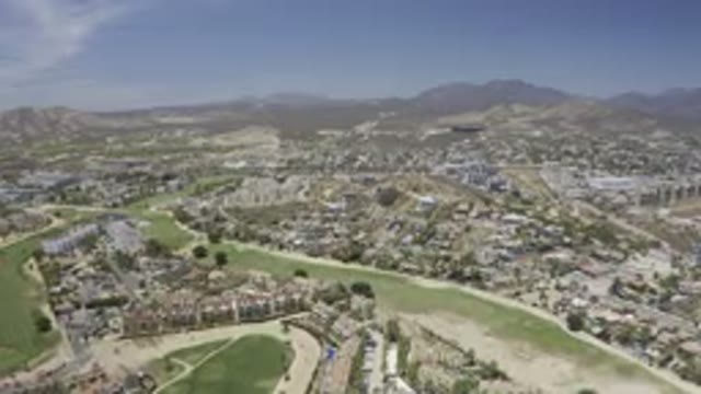 LOS CABOS MEXICO-2019: Slow Panoramic Drone Flyover of Modern Suburban Homes
