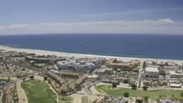 LOS CABOS MEXICO-2019: A View Of The Blue Sky Overlooking Buildings And Homes