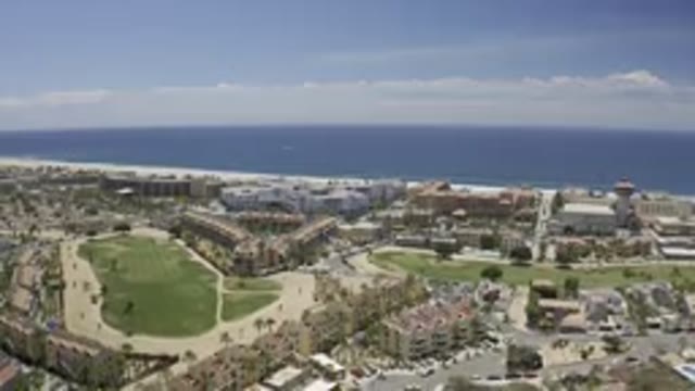 LOS CABOS MEXICO-2019: Vertical Panning Drone Footage Over A Coastal Urban Area