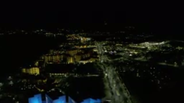 LOS CABOS MEXICO-2019: A City On A Moonless Night With A Lit Highway And
