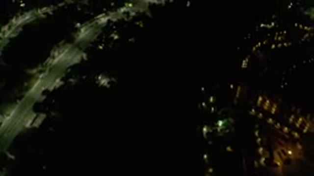 LOS CABOS MEXICO-2019: Aerial Photo Of A Dark Dimly Lit City With A Massive