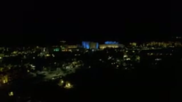 LOS CABOS MEXICO-2019: Night Air Footage Of The Lights Of A City Taken From A