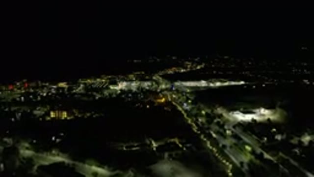 LOS CABOS MEXICO-2019: Forward Moving Drone Footage Over Busy Street And Shops