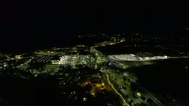 LOS CABOS MEXICO-2019: Top View Of A City At Night Several Cars Passing And