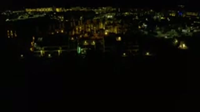 LOS CABOS MEXICO-2019: Overhead View At Night Of Yellow Lighted Buildings In