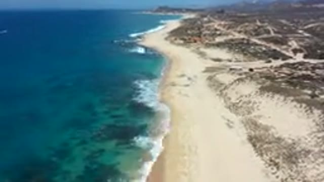 LOS CABOS MEXICO-2019: Camera Slowly Panning the City Coastal Line on a Summer