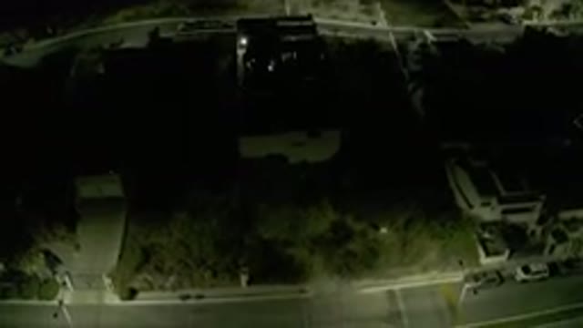 LOS CABOS MEXICO-2019: Dark Drone View of Residential Street with Houses and Cars