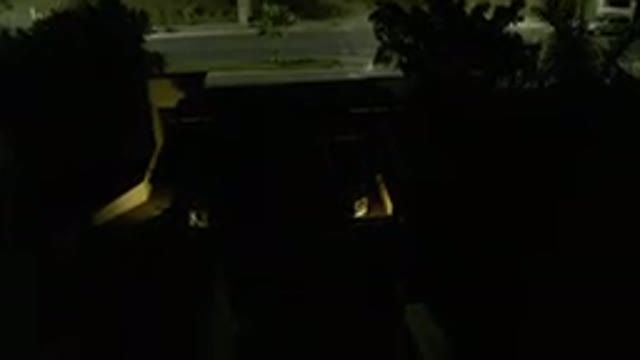 LOS CABOS MEXICO-2019: A Dark Home With Two Lights At The Driveway And An Empty