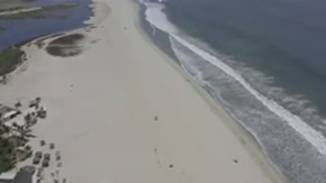 LOS CABOS MEXICO-2019: Aerial View Of The Beach Waves In The Sea On A Sunny Day