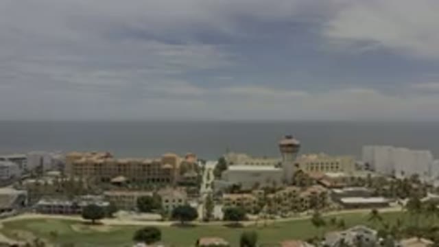 LOS CABOS MEXICO-2019: Holiday Vacation Summer Beach Sea Sky Cloud Buildings